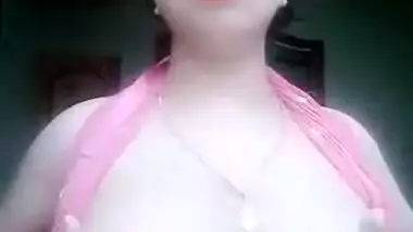 Super sexy aunty striptease in nature's garb MMS