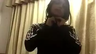 Desi teen knows that viewers love her XXX striptease show in bedroom