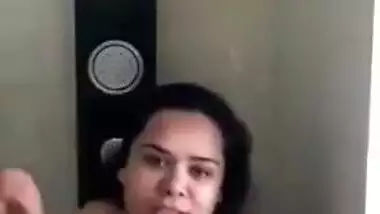 Gorgeous Desi aunty with huge XXX breasts fools around in bathroom