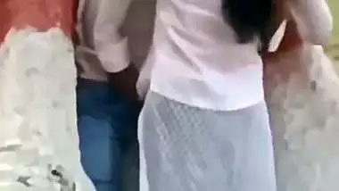 College couple enjoys outdoor sex below a big tree