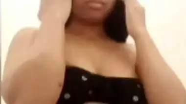 Chubby shy Indian girl showing round boobs to lover